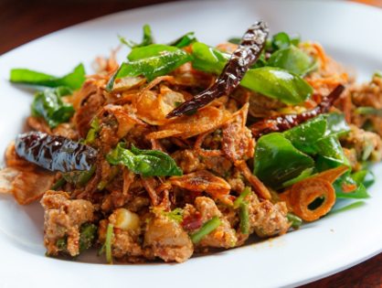 House special stir-fry with crispy basil and dried chili