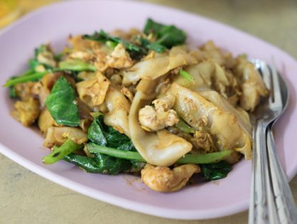 Pad see ew wide rice noodles with Chinese broccoli