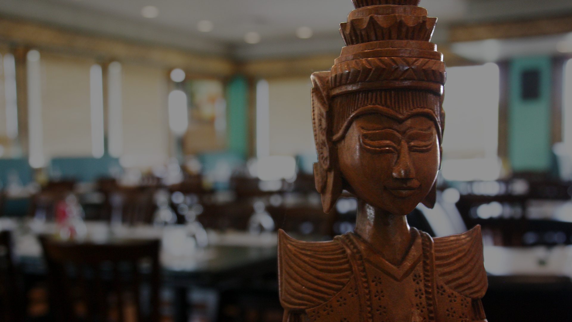Carved Thai statue in the House of Thai dining room